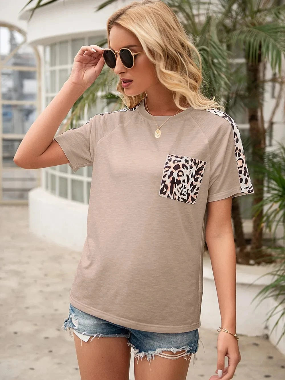 Trendsi Ivy Lane Pocketed Leopard Round Neck Short Sleeve T-Shirt