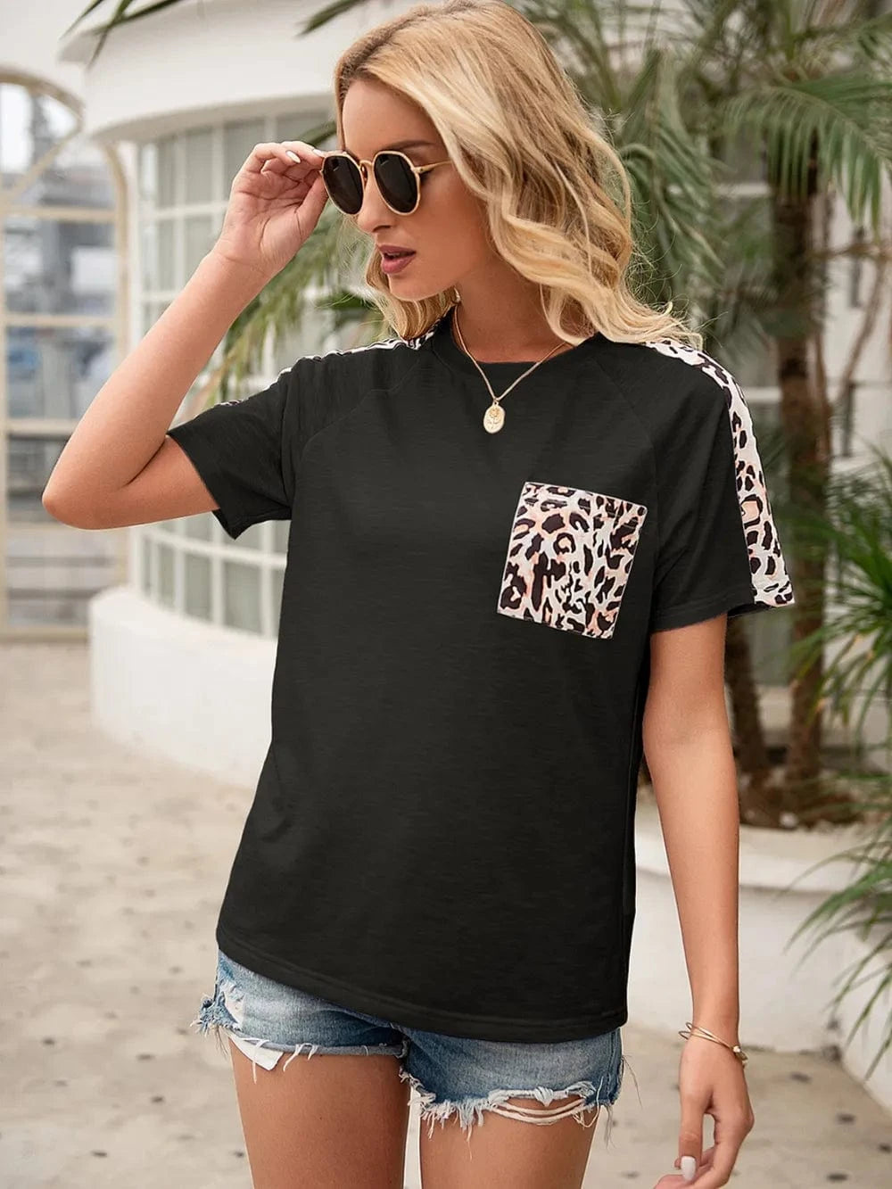 Trendsi Ivy Lane Pocketed Leopard Round Neck Short Sleeve T-Shirt