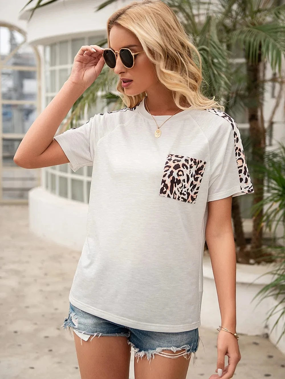 Trendsi Ivy Lane Pocketed Leopard Round Neck Short Sleeve T-Shirt