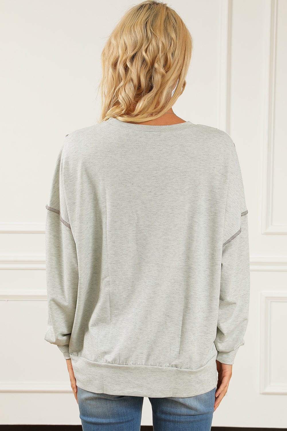 Trendsi Leopard Exposed Seams Round Neck Sweatshirt