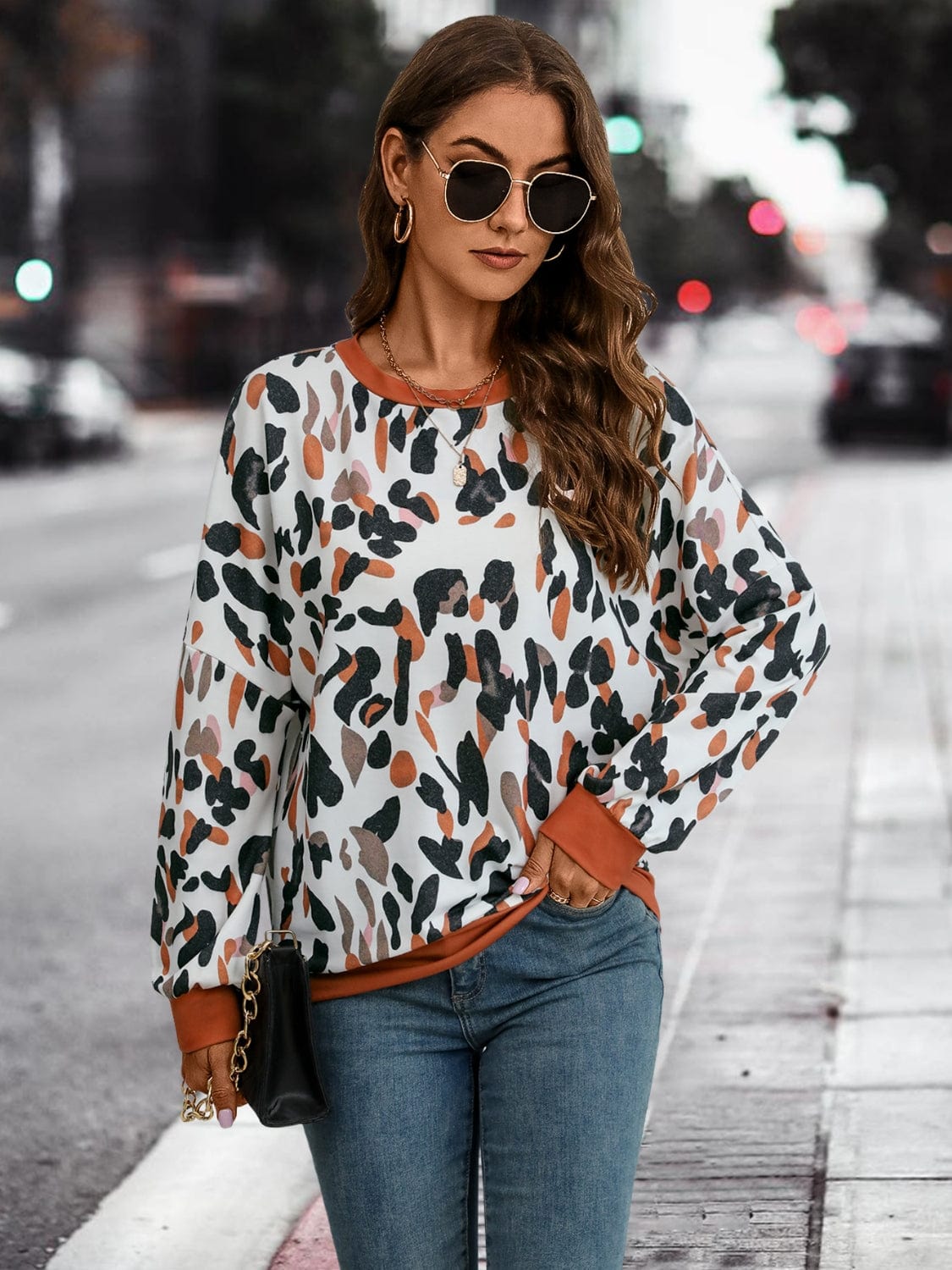 Trendsi Leopard Round Neck Drop Shoulder Sweatshirt