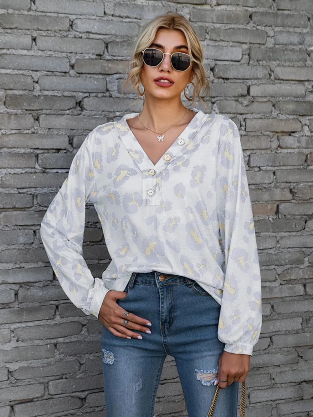 Trendsi Leopard V-Neck Decorative Button Long Sleeve Blouse